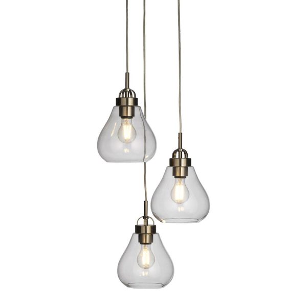 Turua 3 light cluster pendant in antique chrome with clear glass shades on white background lit