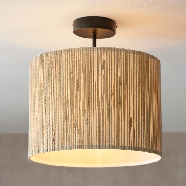 Longshaw semi flush low ceiling light with natural seagrass shade on room ceiling