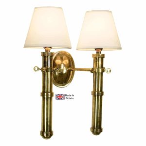Velsheda twin nautical wall light in solid brass shown in light antique with white shades