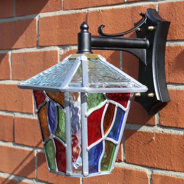 The Chepstow outdoor lantern shown fitted on brick wall