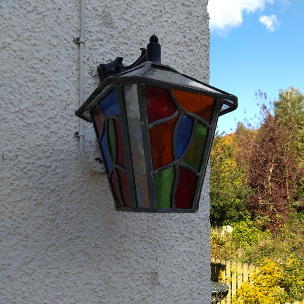 Chepstow multi-coloured lantern on the author's back wall at home