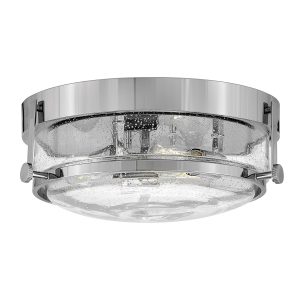 Hinkley Harper 3 lamp flush light in polished chrome with clear seeded glass on white background