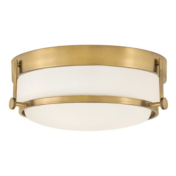 Hinkley Harper 3 lamp flush ceiling light in heritage brass with opal glass on white background