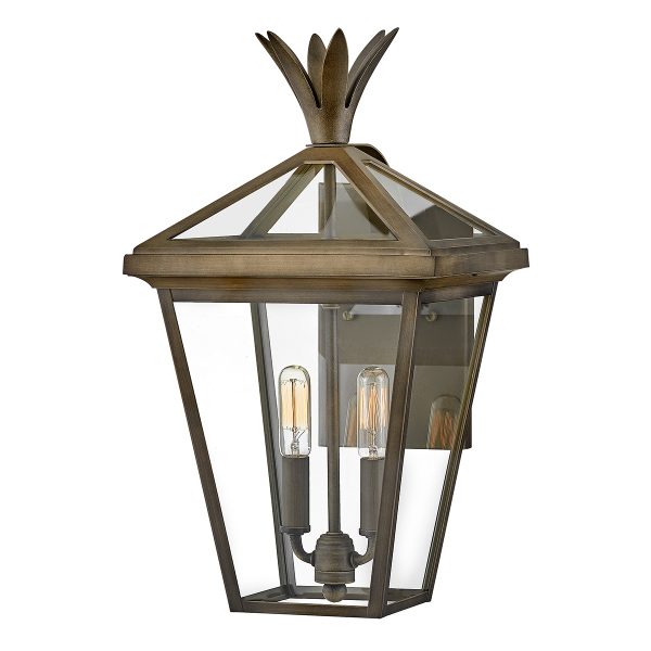 Palma 2 light medium outdoor wall lantern in burnished bronze on white background, lit