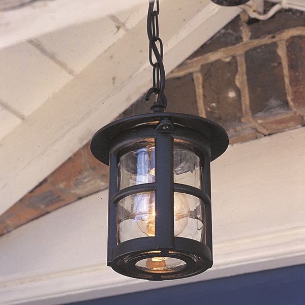 Traditional black finish hanging porch lantern, shown fitted in covered porch