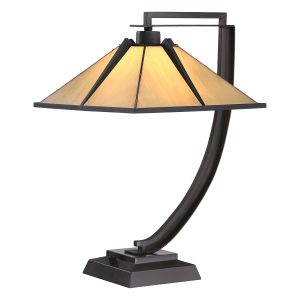 Pomeroy Art Deco style Tiffany table lamp in western bronze on white background, lit