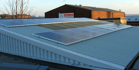 Solar PV panels on warehouse roof - Universal Lighting Services Ltd