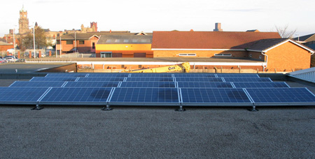 Solar PV panels on showroom roof - Universal Lighting Services Ltd