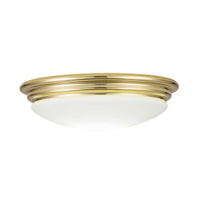 Brompton 1 light flush bathroom ceiling light in polished brass on white background, lit.