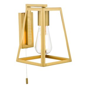 Claudia switched industrial wall light in solid natural brass on white background lit