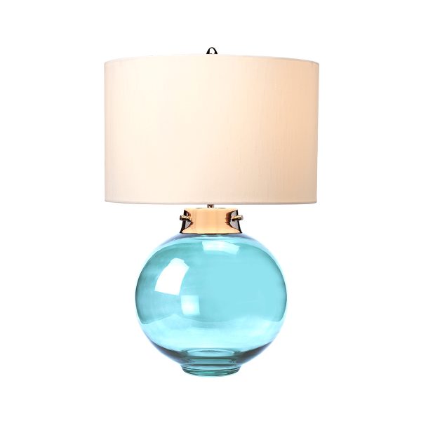 Elstead Kara blue glass table lamp with polished nickel metalwork and Hepplewhite shade, shown lit on white background.