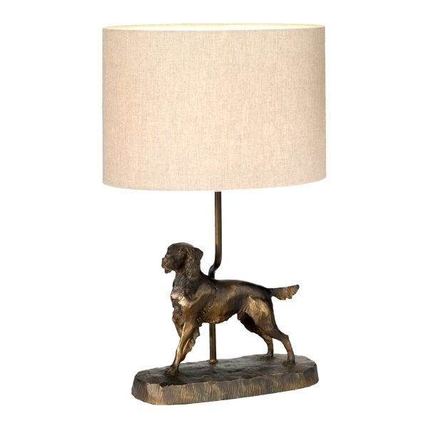 Rufus single light dog table lamp in bronze on white background, lit.