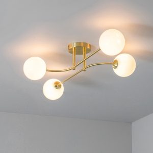 Endon Otto retro 4 lamp semi-flush low ceiling light in brushed brass insitu