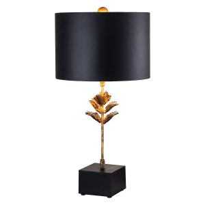 Camilia single light table lamp in antique gold and black on white background