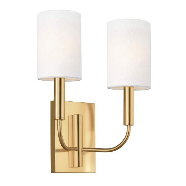 Feiss Brianna twin wall light in burnished brass finish with white linen shades on white background.