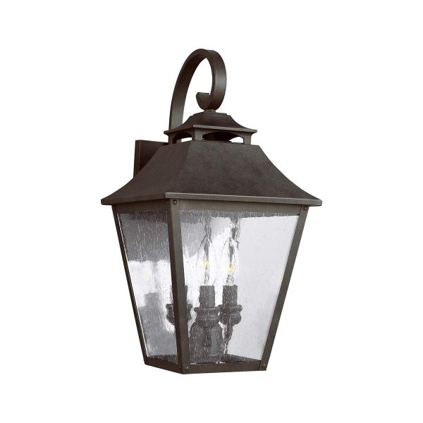 Feiss Galena 3 light large outdoor wall lantern in sable on white background.