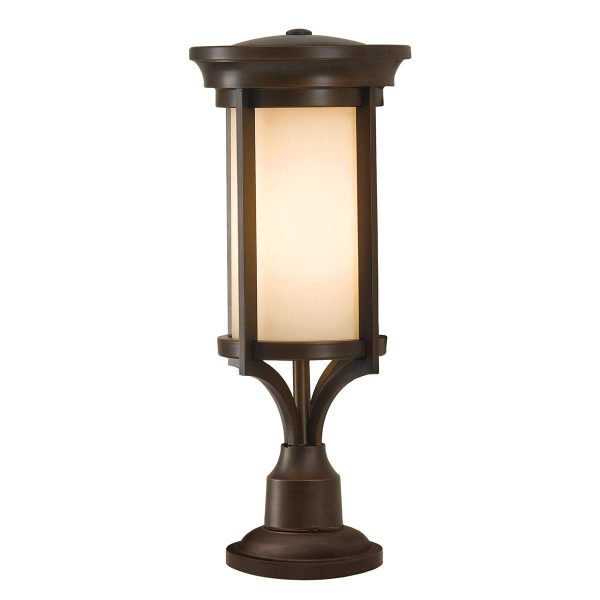 Feiss Merrill 1 light small outdoor pedestal lantern in heritage bronze on white background.