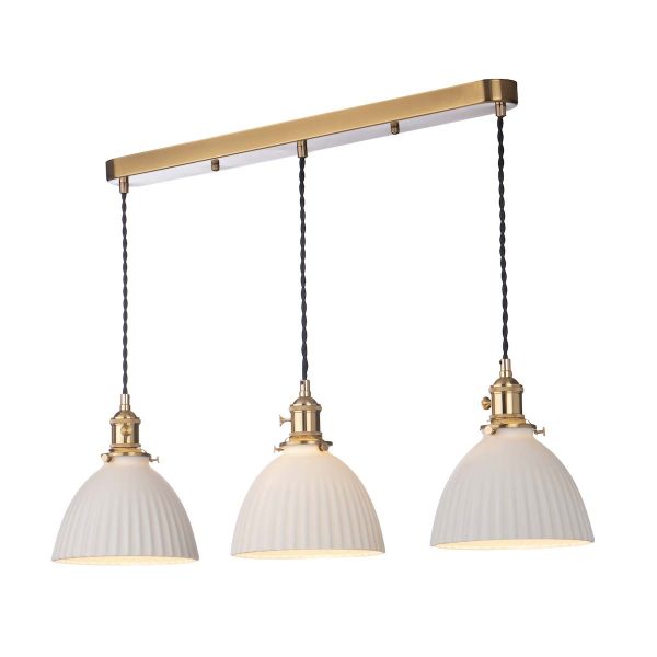 Hadano 3 light bar pendant in natural brass with domed white ceramic shades on white background lit