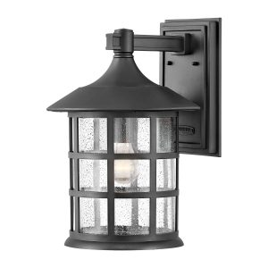 Hinkley Freeport 1 light large textured black outdoor wall lantern on white background.