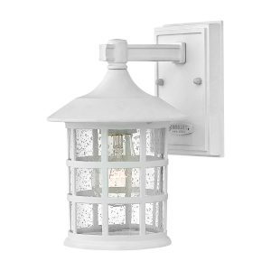 Hinkley Freeport 1 light small outdoor wall lantern in textured white on white background.