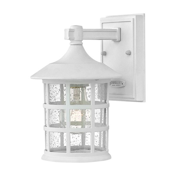 Hinkley Freeport 1 light small outdoor wall lantern in textured white on white background.