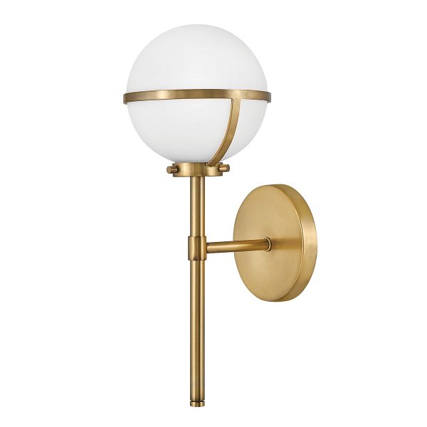 Hinkley Hollis 1 light bathroom wall light in heritage brass finish with opal glass on white background.