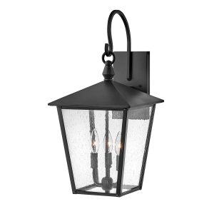 Hinkley Huntersfield 3 light large outdoor wall lantern in black on white background.