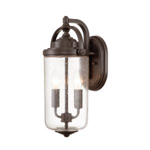 Hinkley Willoughby 2 light wall lantern in oil rubbed bronze on white background, lit.