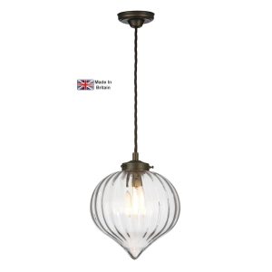 Holborn pendant light in solid antique brass with ribbed glass shade on white background lit