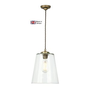 Ibsley single pendant light in classic aged brass on white background lit