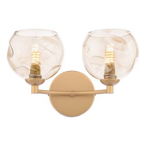 Izzy double wall light in gold with champagne glass shades on white background lit
