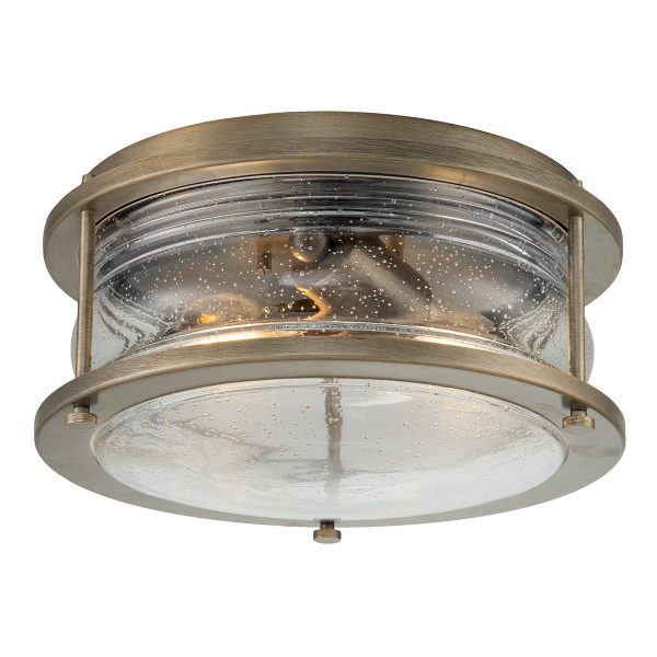 Kichler Ashland Bay 2 light flush outdoor porch light in burnished brass on white background, lit.