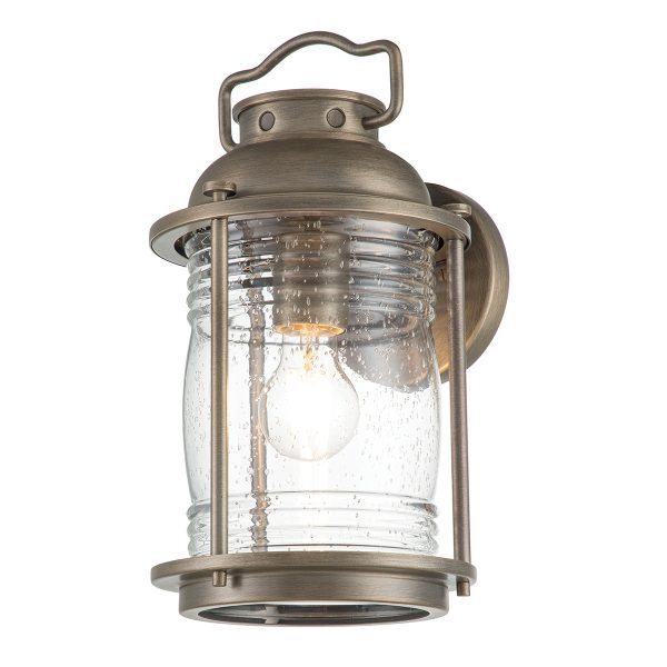 Kichler Ashland Bay 1 light medium outdoor wall lantern in burnished bronze on white background, lit.