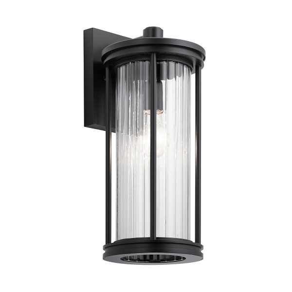 Barras medium outdoor wall lantern in black with ribbed glass shade on white background