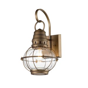 Kichler Bridge Point 1 light medium outdoor wall lantern in natural brass finish on white background, lit.