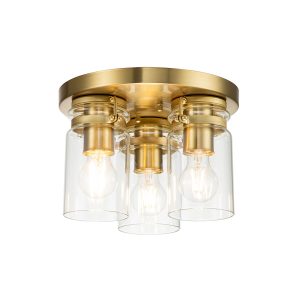 Kichler Brinley 3 light flush in brushed brass finish on white background, lit.