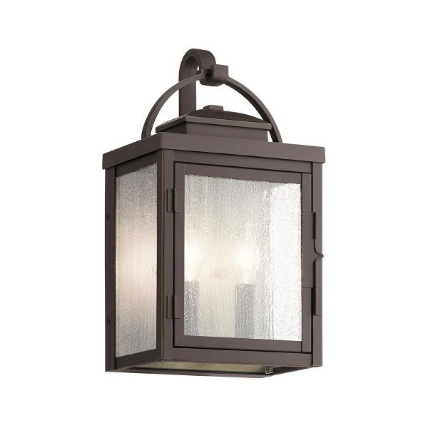 Kichler Carlson 2 light outdoor wall lantern in rubbed bronze on white background.