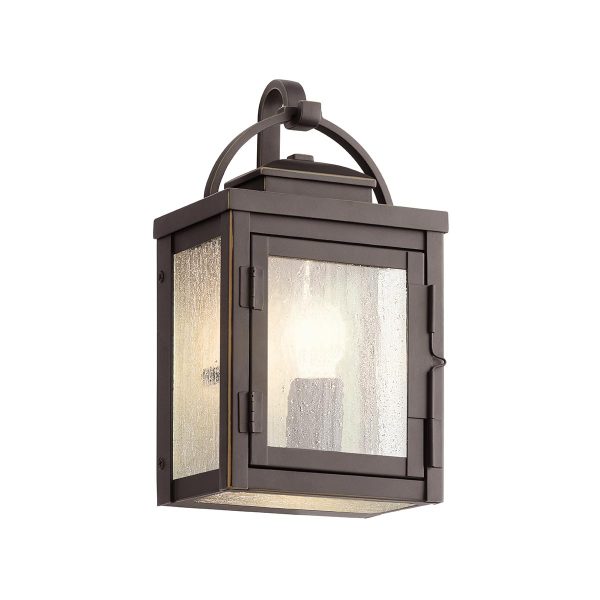 Kichler Carlson 1 light outdoor wall lantern in rubbed bronze on white background.