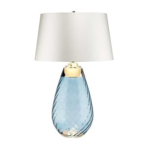 Elstead Lena 2 light large blue glass table lamp in polished nickel with off-white shade on white background.