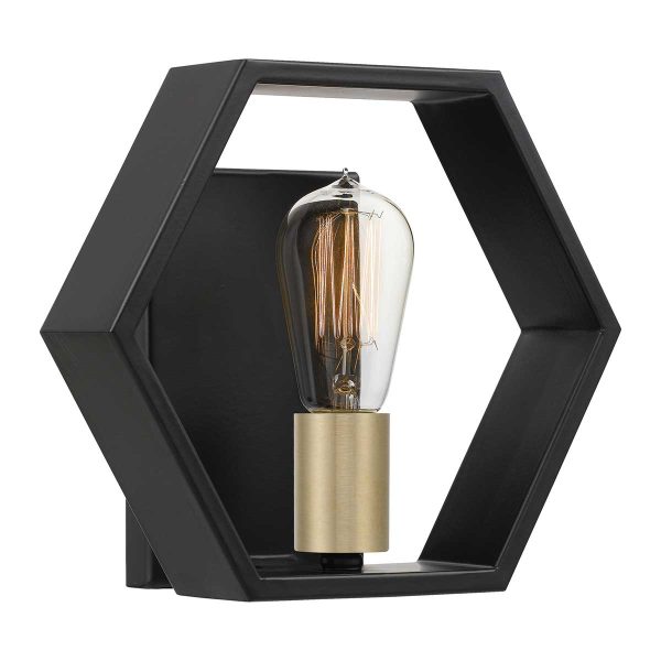 Quoizel Bismarck modern 1 light wall light in black and gold on white background, lit