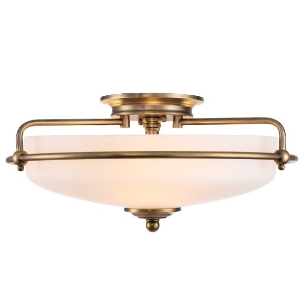 Quoizel Griffin Art Deco style 3 light flush ceiling light in weathered brass on white background