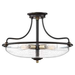 Griffin 4 light semi flush ceiling light in Palladian bronze with seeded glass shade on white background