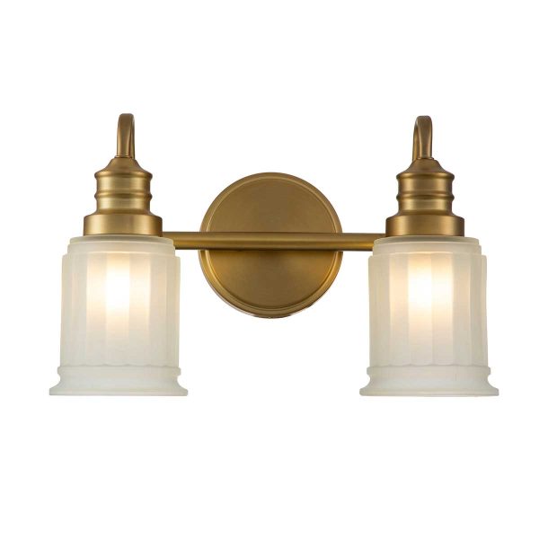 Quoizel Swell twin bathroom wall light in brushed brass on white background lit