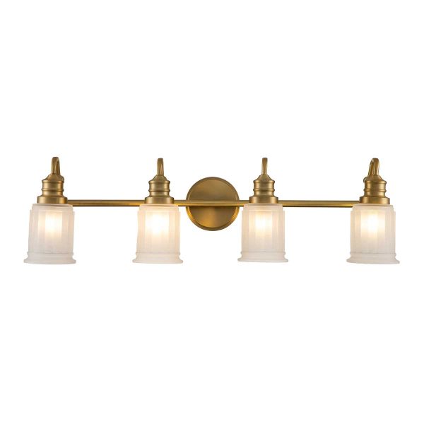 Quoizel Swell 4 light bathroom wall light in brushed brass on white background lit