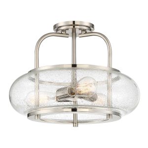 Quoizel Trilogy 3 light semi flush ceiling light in brushed nickel on white background, lit