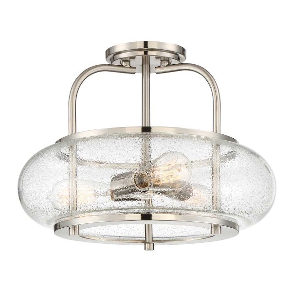 Quoizel Trilogy 3 light semi flush ceiling light in brushed nickel on white background, lit