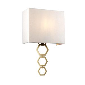 Ria medium 1 light aged brass wall light with ivory shade on white background, lit