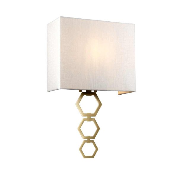 Ria medium 1 light aged brass wall light with ivory shade on white background, lit