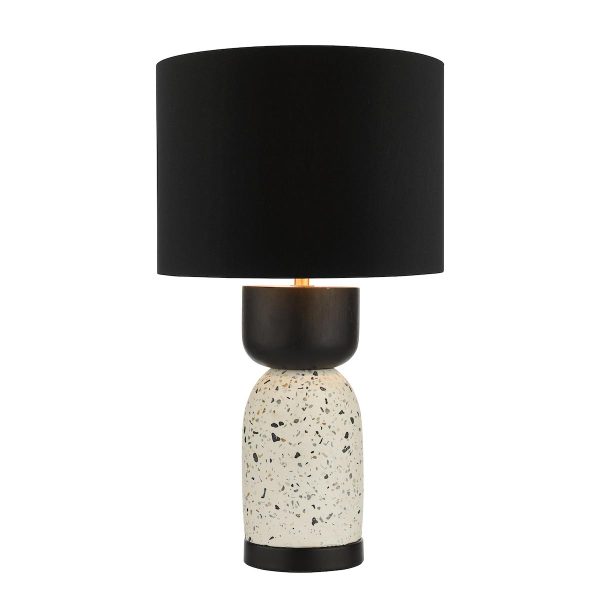 Roja modern table lamp in white terrazzo and black wood on white background lit