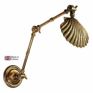 Oyster double adjustable wall light in solid brass in light antique